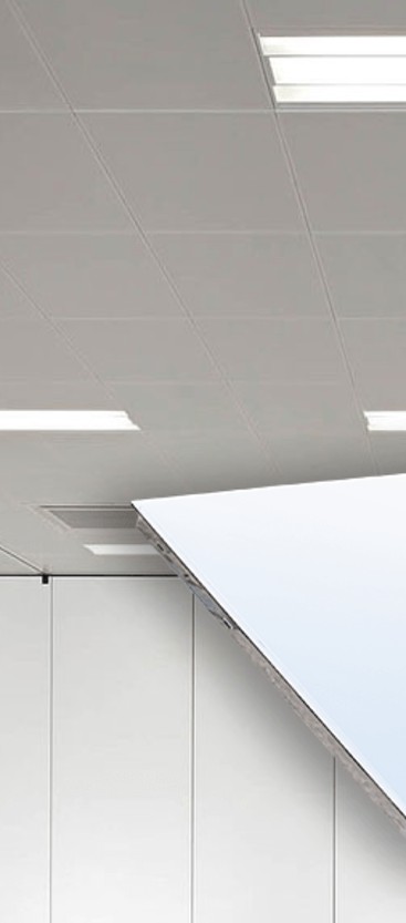Clip-in metal ceiling tiles — seamless concealed grid ceiling in premium office Ahmedabad by Yashvi Infra Co