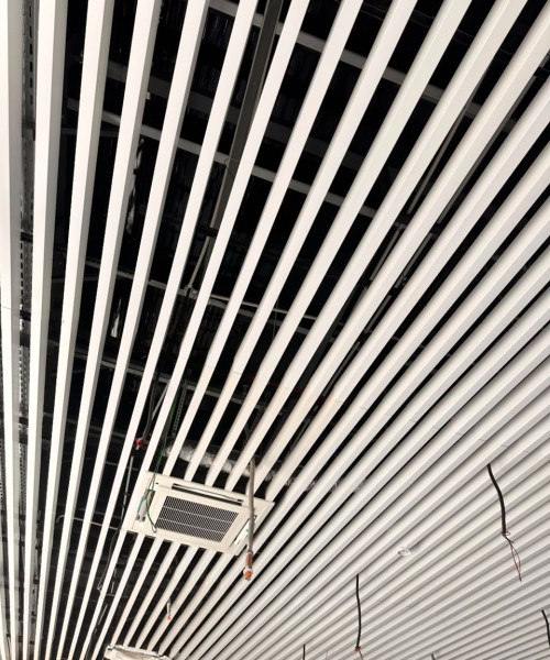 U-shaped baffle ceiling Adani Airport Mundra — Yashvi Infra Co Gujarat