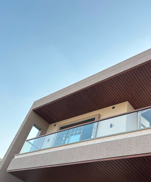 Wooden finish metal ceiling installation in Kadi Gujarat — Yashvi Infra Co